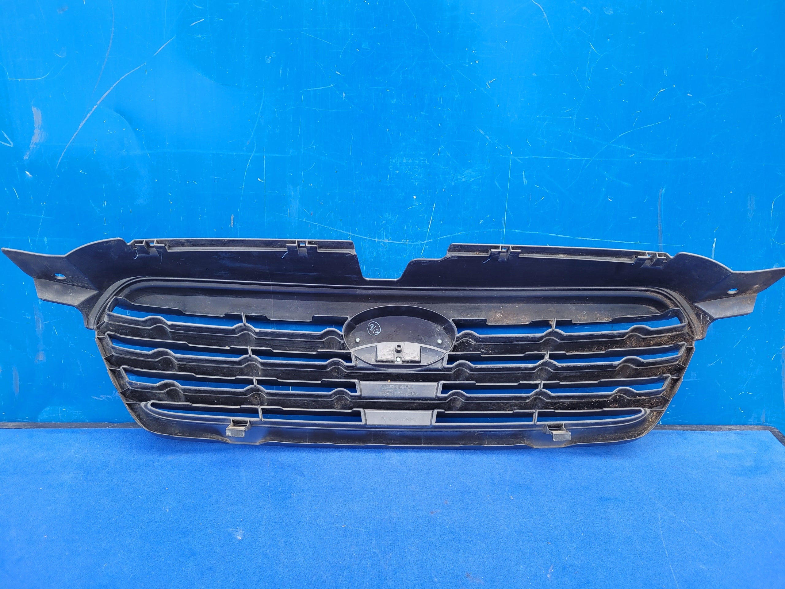 Kühlergrill Subaru OUTBACK FRONTGRILL 91121AG160 Kühlergitter