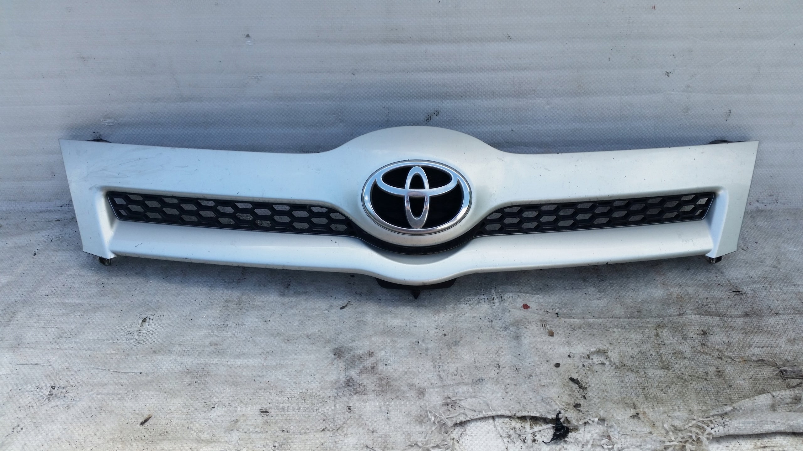 Kühlergrill Toyota E 7 COROLLA VERSO 5 FRONTGRILL 75100SZ300 Kühlergitter